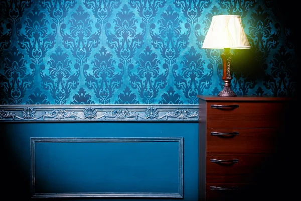 Vintage lamp in retro blue toned interior — Stock Photo, Image