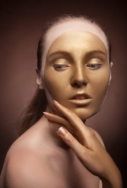 Mädchen mit Gold Mode Make-up — Stockfoto
