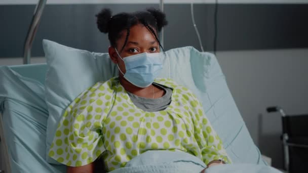 Portrait of young patient with sickness wearing face mask — Stock Video