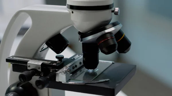 Biochemistry microscope in scientific laboratory at clinic — Stock Photo, Image