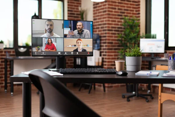 Online video call meeting with workmates on computer — Stockfoto
