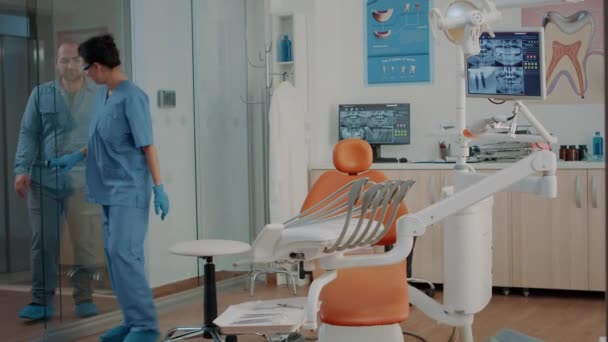 Patient arriving at dental checkup visit in stomatology cabinet — Video Stock