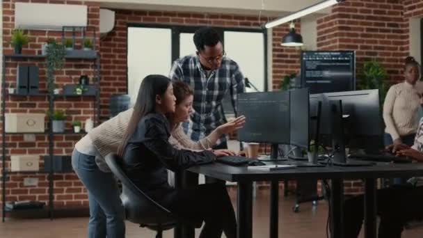 Mixed team of software engineers brainstorming ideas for new cloud computing user interface — Video Stock