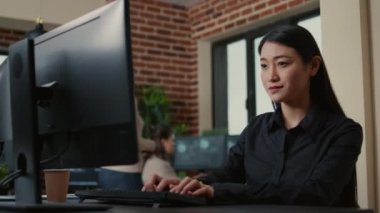 Portrait of programer writing algorithm smiling after successfuly compiling source code