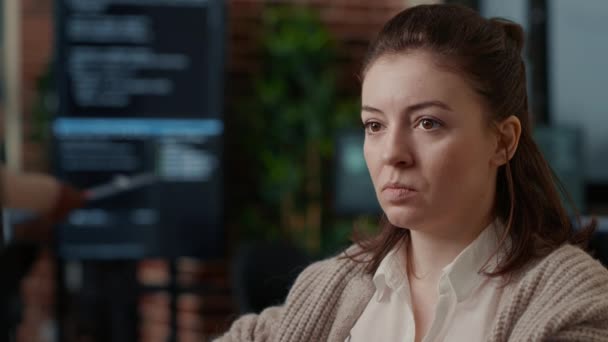 Portrait of caucasian software developer working focused looking at computer screen while typing — Vídeo de Stock