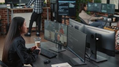 Software company employee in video call conference with client team discussing coding project