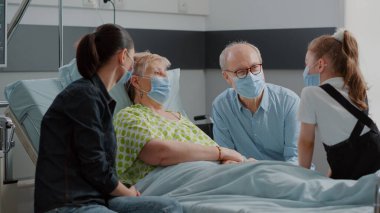 Mother and child visiting grandma with sickness during coronavirus pandemic