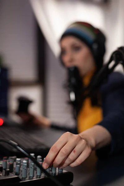 Close up of woman using streaming equipment live — Stockfoto