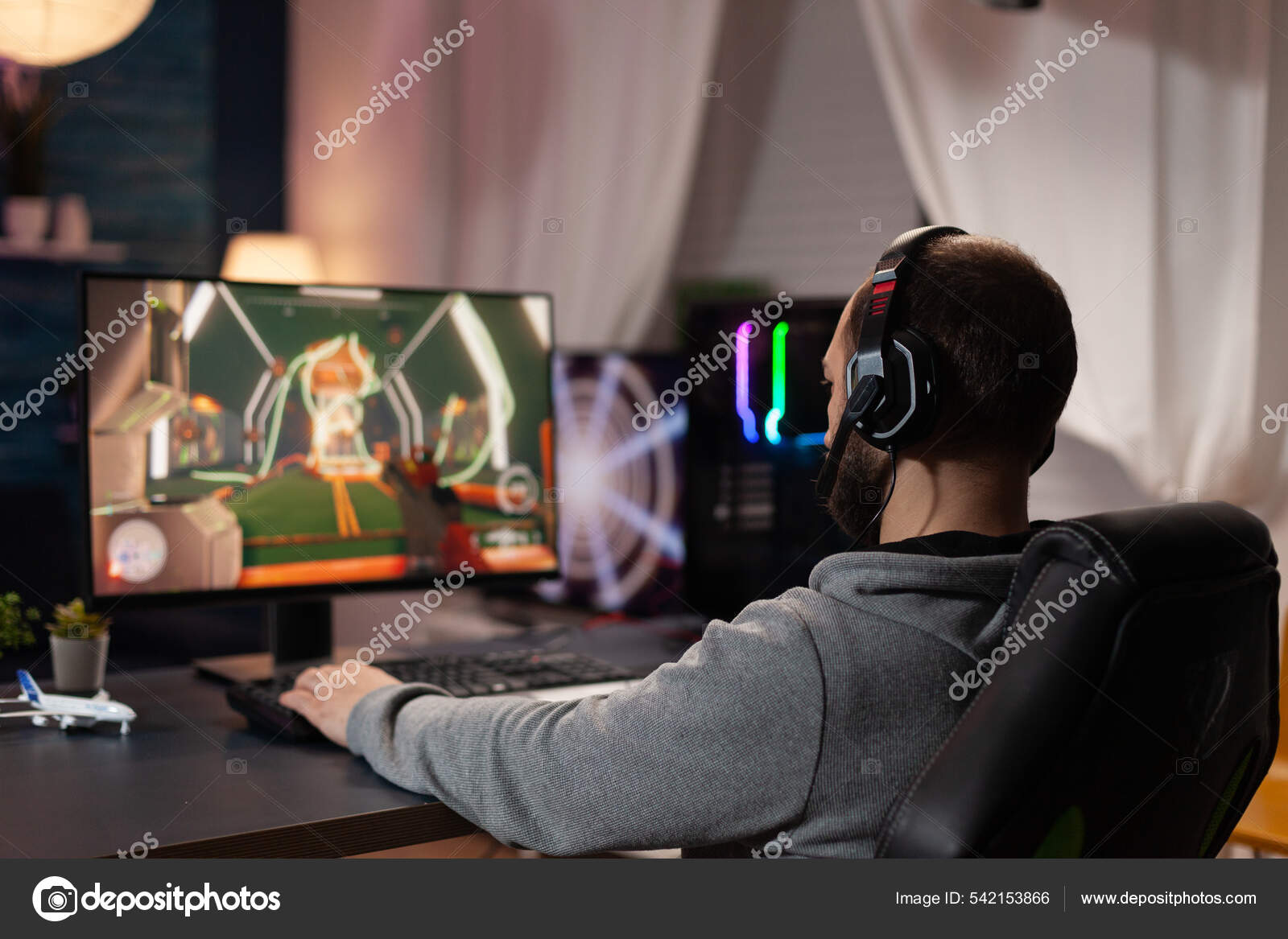 Man gamer teaching his girlfriend playing space shooter video game on RGB  powerful personal computer. Pro cyber woman with headset performing video  games streaming from home during online tournament Stock Photo 