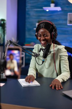 Social media creator woman smiling while recording video content