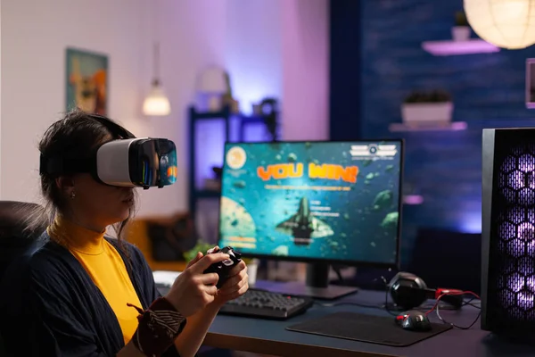 Woman winning video games with vr glasses on computer — Stock Fotó