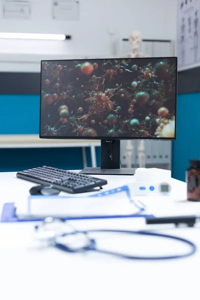 Computer met coronavirus cel illustratie op het scherm — Stockfoto
