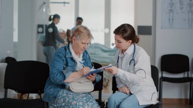 Close up of doctor giving medical advice to senior woman