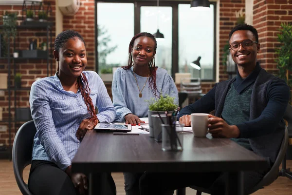 African american business company team sitting at desk in modern office interior — Stock Photo, Image