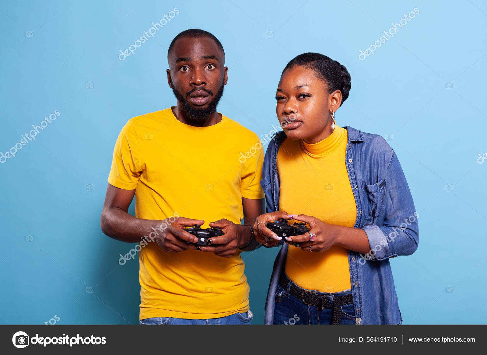 Boyfriend and girlfriend playing video games with controller on console  Stock Photo by ©DragosCondreaW 564191710