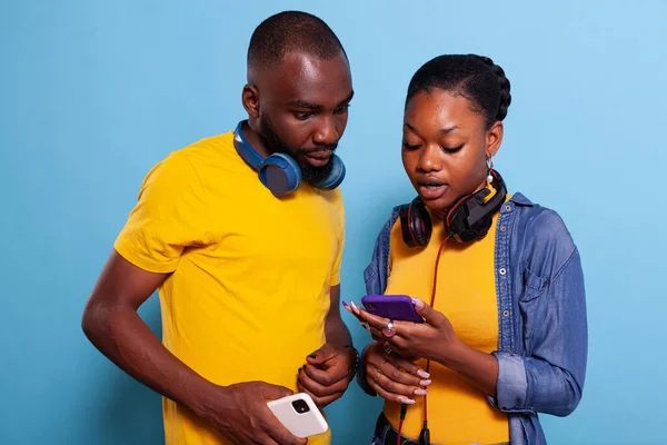 Boyfriend and girlfriend playing video games with controller on console  Stock Photo by ©DragosCondreaW 564191710