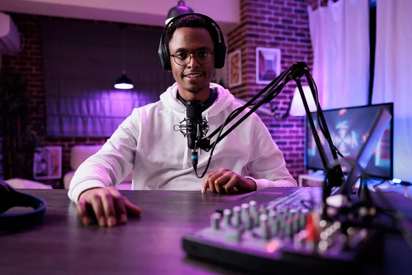 POV of presenter using podcast equipment to broadcast live discussion — Stock Photo, Image