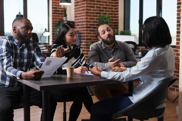 Multiethnic executive managers interviewing african american applicant — ストック写真