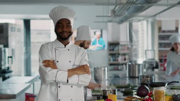 Portrait of confident man working as chef in gourmet kitchen — Video Stock