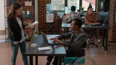 Diverse team of people brainstorming ideas to plan strategy
