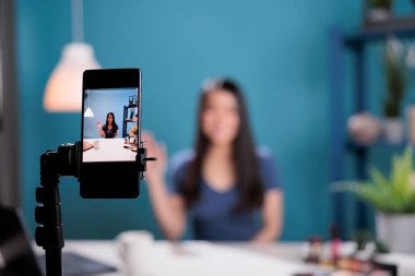 Behnind the scene of content creator talking with remote subscribers