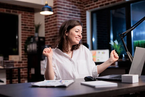 Happy joyful young adult businesswoman celebrating finishing startup project before deadline. — 스톡 사진