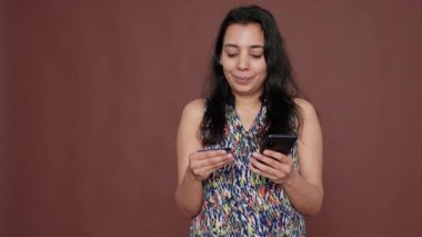 Modern adult shopping with credit card on online website