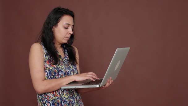 Disappointed person using technology on laptop to scroll website — Stok video