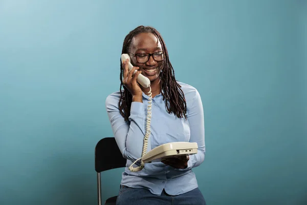 Confident positive young adult woman answering customer calling for consultancy. — Stock Photo, Image