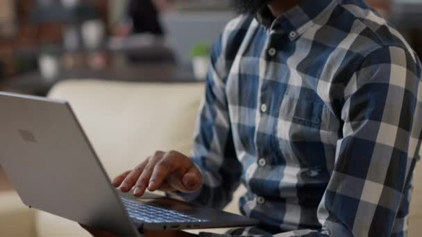 Male entrepreneur using laptop to plan financial analysis — ストック動画