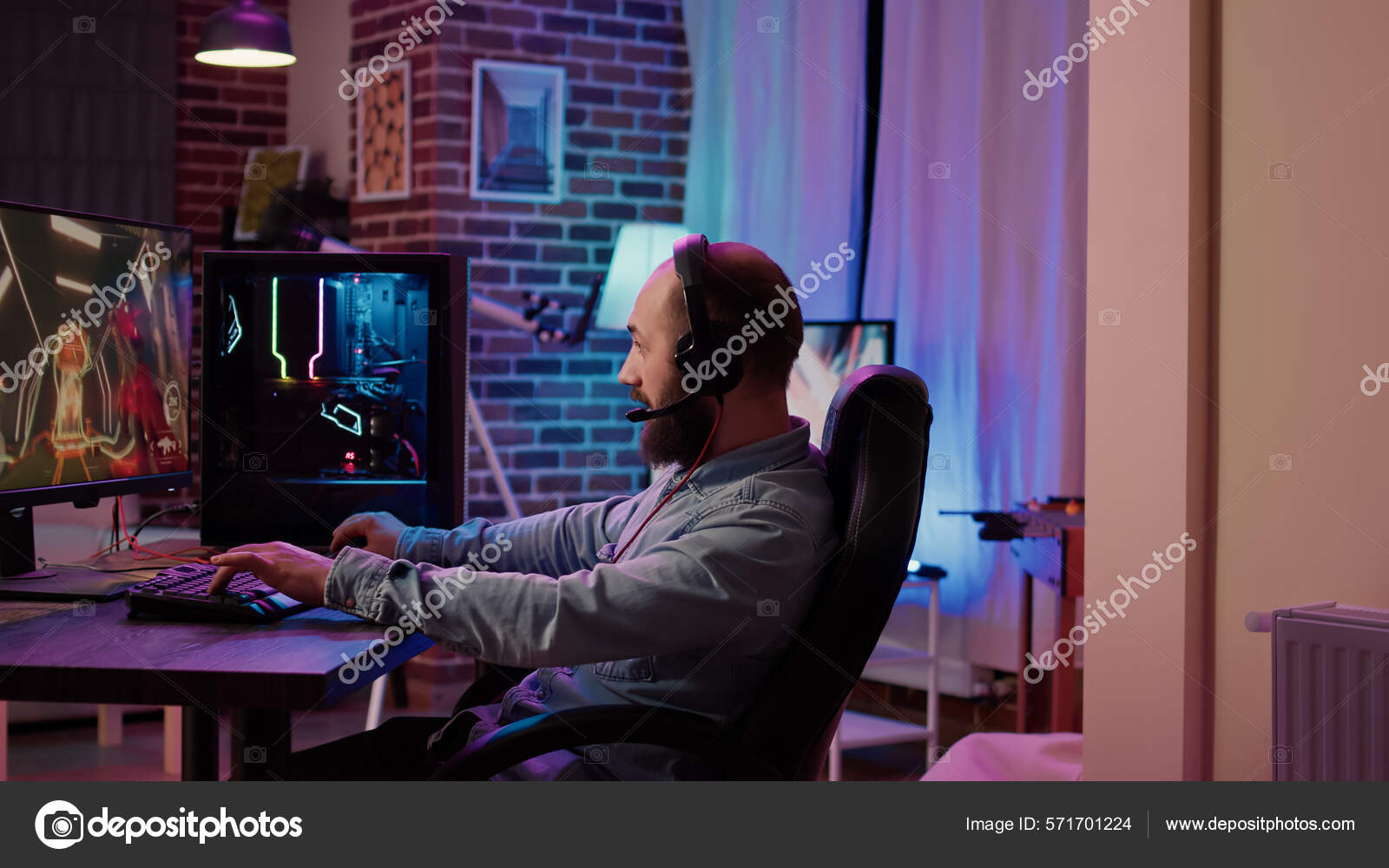 Free Photo  Player winning video games with controller and headset in  front of monitor. man using joystick and headphones, playing online games  on computer. person celebrating game win for leisure.