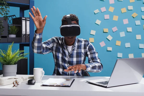 Company office worker wearing virtual reality headset technology while enjoying metaverse. — Stock Photo, Image