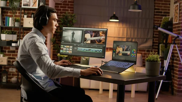 Asian Man Listening Music Editing Video Software Using Computer Work — Stock Photo, Image