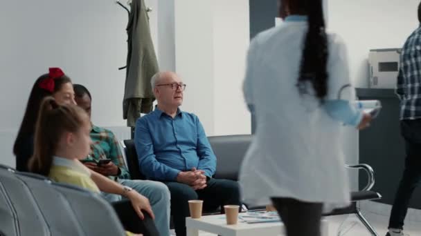 African American Man Senior Patient Waiting Together Hospital Reception Looking — Stock Video