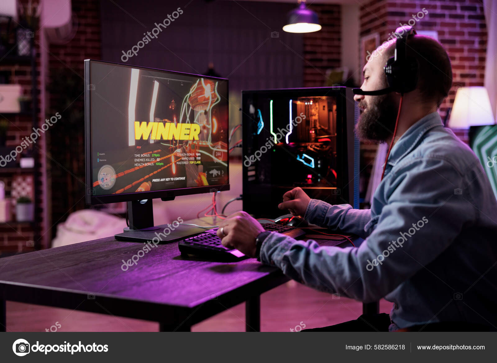 Free Photo  Player winning video games with controller and headset in  front of monitor. man using joystick and headphones, playing online games  on computer. person celebrating game win for leisure.