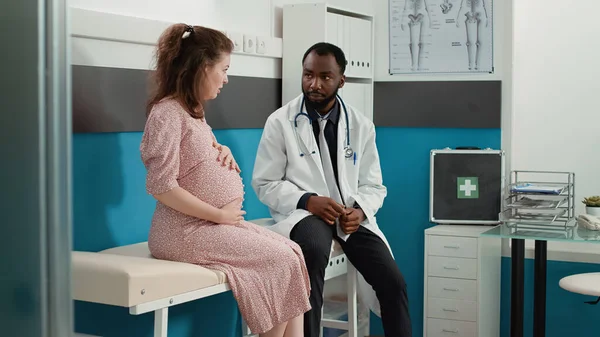 African American Specialist Consulting Pregnant Woman Checkup Visit Examination General — Fotografia de Stock