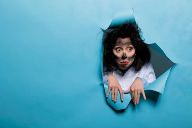 Lunatic scientist looking dumb and amusing after toxic chemical explosion. Crazy foolish biochemist with funny expressions, dirty face and messy hair after failed laboratory experiment.