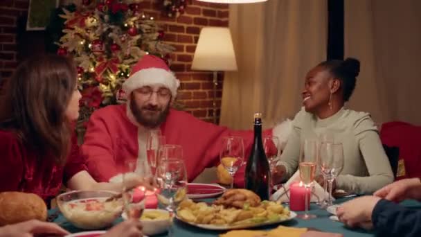 Festive Man Wearing Santa Claus Costume Christmas Dinner Party Talking — Vídeos de Stock