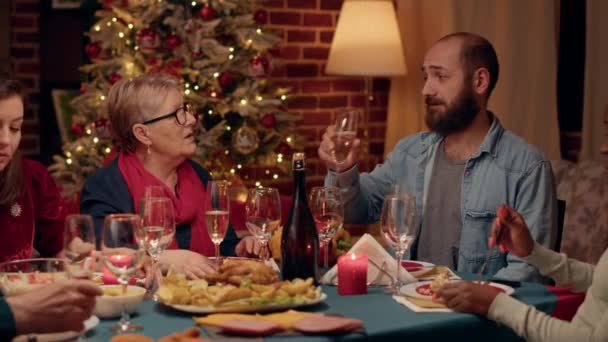 Confident Man Talking Positive Senior Woman While Drinking Sparkling Wine — Vídeo de stock