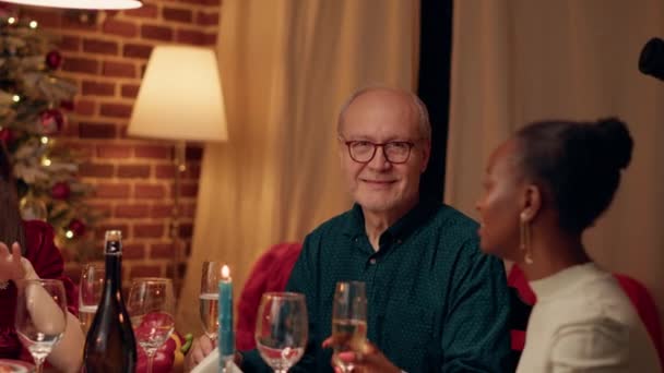 Happy Senior Person Smiling Heartily Camera While Enjoying Christmas Dinner — Wideo stockowe