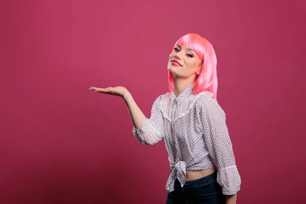 Pretty Female Model Having Palm Out Hold Imaginary Product Doing — Stock fotografie