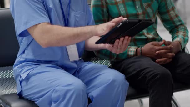 African American Man Male Nurse Looking Digital Tablet Find Healthcare — Stock Video