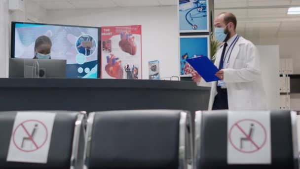 Diverse Patients Sitting Waiting Room Lobby Attend Checkup Visit Appointment — Stock video