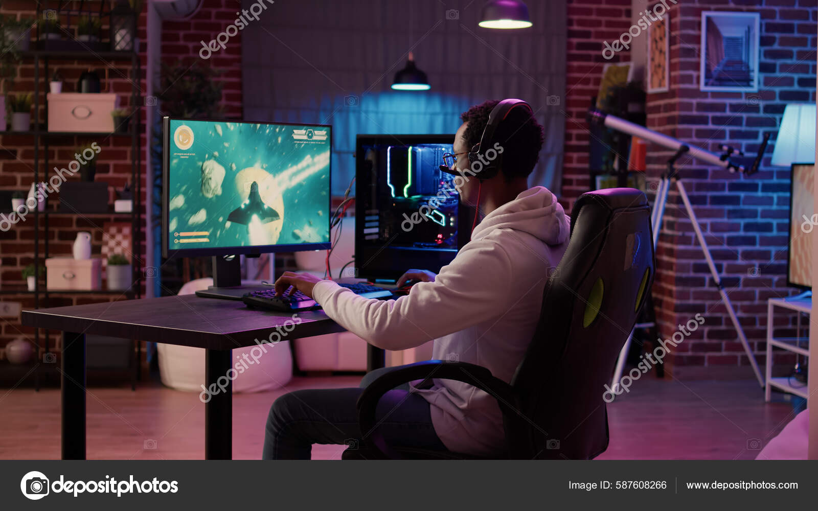 Free Photo  Person playing video games with controller on computer. player  using joystick and wearing headphones to play online game on monitor.  modern man using gaming equipment to have fun.