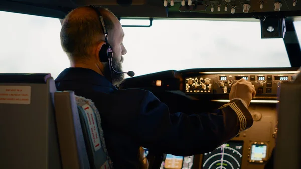 Airplane Captain Pushing Buttons Fix Altitude Longitude Flying Plane Cockpit — Stock Fotó