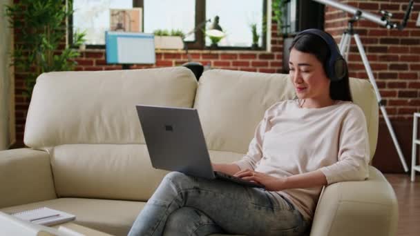 Smiling Heartily Student Attending Online Class Laptop While Sitting Sofa — Video Stock