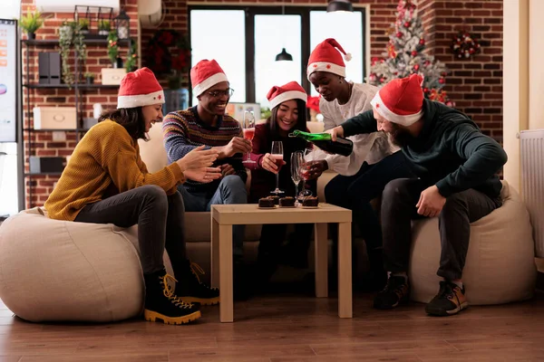 Colleagues Pouring Glasses Wine Christmas Festivity Feeling Festive Happy Party — Photo