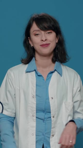 Vertical Video Portrait Woman Scientist Crossing Arms Blue Background Wearing — Vídeo de Stock