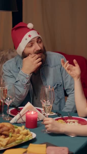 Vertical Video Festive People Talking Christmas Dinner While Enjoying Traditional — Stockvideo