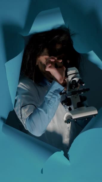 Vertical Video Crazy Foolish Scientist Using Laboratory Microscope Studio Being – stockvideo
